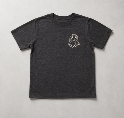 A dark heather gray short-sleeve t-shirt with a small white ghost graphic on the left chest, laid flat against a neutral light gray background.