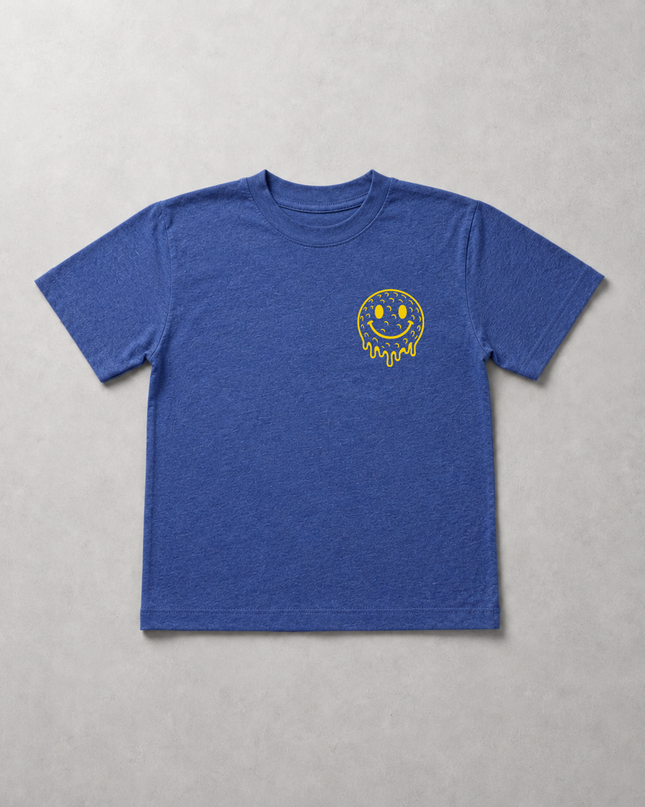 A heather blue short-sleeve t-shirt with a small yellow dripping smiley face graphic on the left chest, laid flat on a textured gray background.