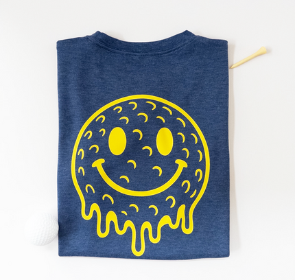 Blue t-shirt with a yellow smiley face design on a white background