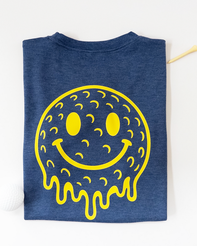 Blue t-shirt with a yellow smiley face design on a white background