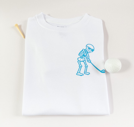 White t-shirt with blue skeleton design on a light background