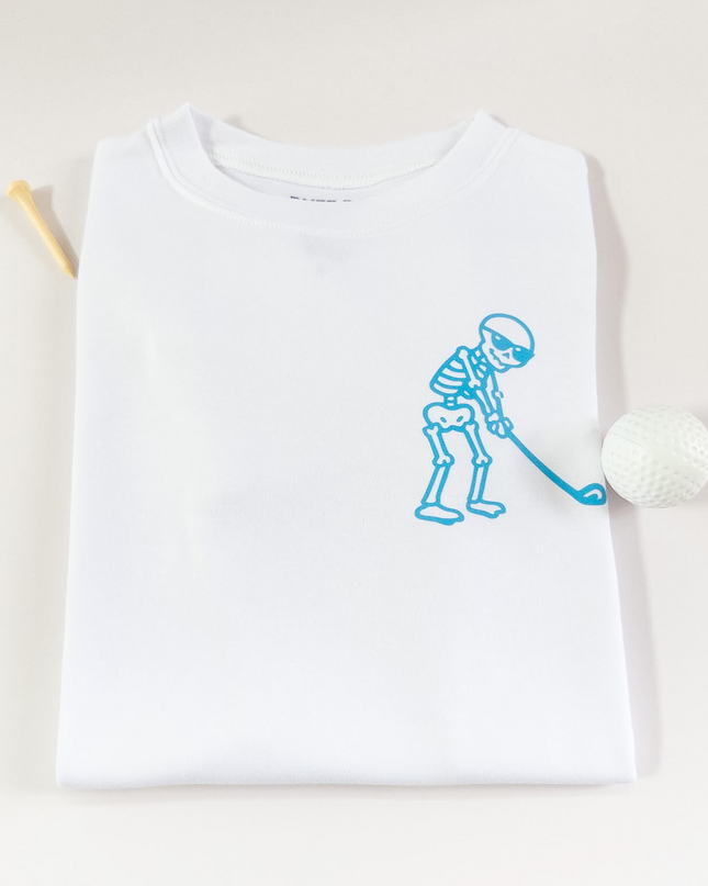 White t-shirt with blue skeleton design on a light background