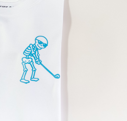 White t-shirt with blue skeleton design on a white background