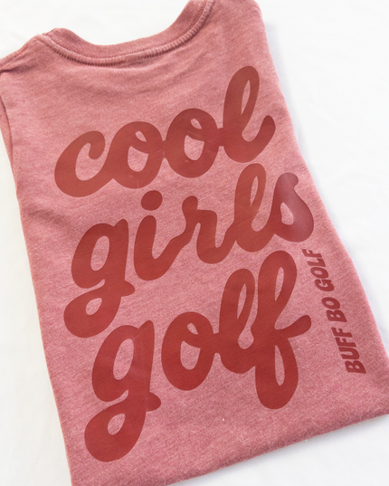 Pink tank top with 'cool girls golf' text on a white background
