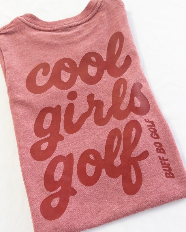 Pink tank top with 'cool girls golf' text on a white background