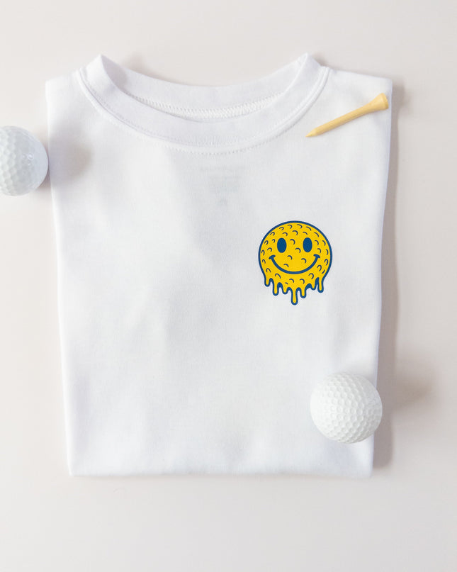White kids t-shirt with a smiley face design on a light gray background