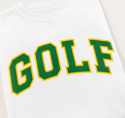 White sweatshirt with 'GOLF' printed in green and yellow on a white background
