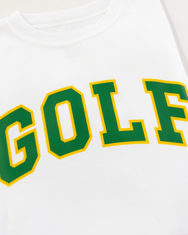 White sweatshirt with 'GOLF' printed in green and yellow on a white background