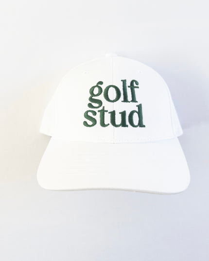 White golf hat with bold green embroidered text reading 'golf stud,' minimalist and stylish golf accessory perfect for young golfers and golf enthusiasts, displayed on a clean white background.