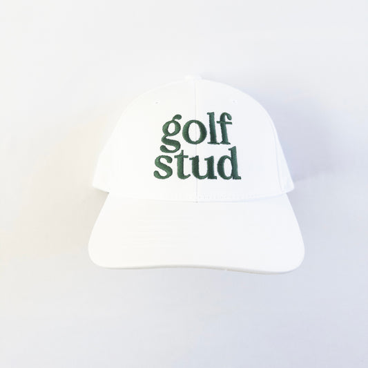White golf hat with bold green embroidered text reading 'golf stud,' minimalist and stylish golf accessory perfect for young golfers and golf enthusiasts, displayed on a clean white background.