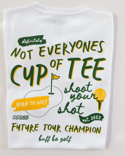 White t-shirt with golf-themed text and graphics on a light gray background