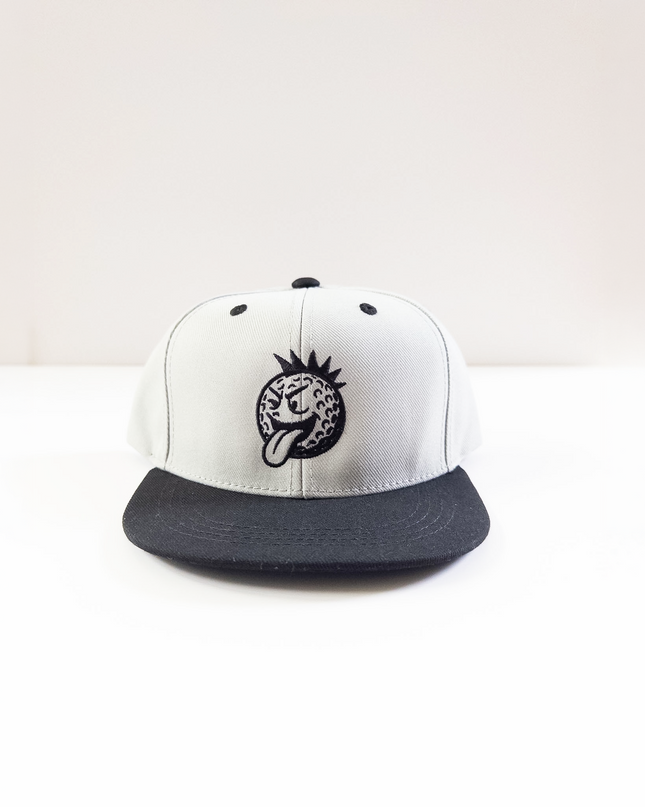 White and black cap with a logo on a white background