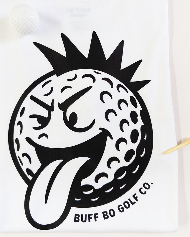 White towel with a black graphic of a golf ball with a face and 'Buff Bo Golf Co.' text on a white background