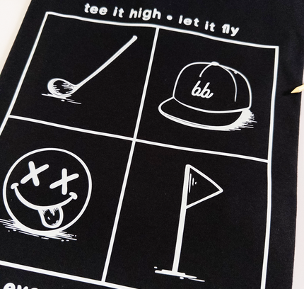 Black t-shirt with white graphics and text on a white background